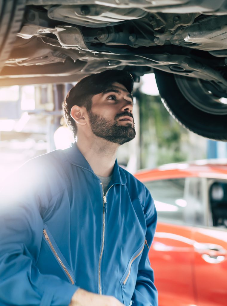 Mechanic inspecting a vehicle - MOT Lingfield